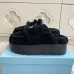 Prada Women's Shearling Lined Mule Slippers Triangle Logo Thick Sole Design for Cozy Luxury Winter Footwear #A57764