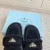 Prada Women's Shearling Lined Mule Slippers Triangle Logo Thick Sole Design for Cozy Luxury Winter Footwear #A57764