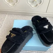 Prada Women's Shearling Lined Mule Slippers Triangle Logo Thick Sole Design for Cozy Luxury Winter Footwear #A57764