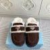 Prada Women's Shearling Lined Mule Slippers Triangle Logo Thick Sole Design for Cozy Luxury Winter Footwear #A57765