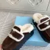Prada Women's Shearling Lined Mule Slippers Triangle Logo Thick Sole Design for Cozy Luxury Winter Footwear #A57765