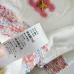 2025 Chanel White Knit Sweater with Colorful Tweed Stripe and CC Logo #A54552