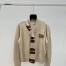 2025  Miu Miu Women's Striped Knit Polo Sweater with a Quarter-Zip or Button Placket and Miu Miu Logo #A54839