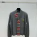 2025  Miu Miu Women's Striped Knit Polo Sweater with a Quarter-Zip or Button Placket and Miu Miu Logo #A54839