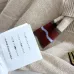 2025  Miu Miu Women's Striped Knit Polo Sweater with a Quarter-Zip or Button Placket and Miu Miu Logo #A54839