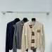 2025  Miu Miu Women's Striped Knit Polo Sweater with a Quarter-Zip or Button Placket and Miu Miu Logo #A54839