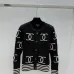 CHANEL Women's Luxury Cable Knit Cardigan  Featuring Bold Signature Double C Logo Intarsia and Contrast Striped Trims #A56341