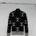 CHANEL Women's Luxury Cable Knit Cardigan  Featuring Bold Signature Double C Logo Intarsia and Contrast Striped Trims #A56341