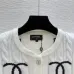 CHANEL Women's Luxury Cable Knit Cardigan  Featuring Bold Signature Double C Logo Intarsia and Contrast Striped Trims #A56341