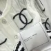 CHANEL Women's Luxury Cable Knit Cardigan  Featuring Bold Signature Double C Logo Intarsia and Contrast Striped Trims #A56341