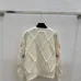 Chanel Women's Knitted Sweaters: Floral   CC Logo Embroidery with Argyle Design for Luxury Fashion Lovers #A56299