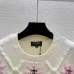 Chanel Women's Knitted Sweaters: Floral   CC Logo Embroidery with Argyle Design for Luxury Fashion Lovers #A56299
