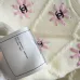 Chanel Women's Knitted Sweaters: Floral   CC Logo Embroidery with Argyle Design for Luxury Fashion Lovers #A56299