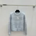 Chanel Women's V   Neck Cardigans  Ribbed Knit with Iconic CC Logo and Button Detail for Luxury Lovers #A56304