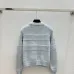 Chanel Women's V   Neck Cardigans  Ribbed Knit with Iconic CC Logo and Button Detail for Luxury Lovers #A56304