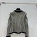 Chanel Women's V   Neck Cardigans  Ribbed Knit with Iconic CC Logo and Button Detail for Luxury Lovers #A56306