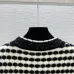 Chanel Women's V   Neck Cardigans  Ribbed Knit with Iconic CC Logo and Button Detail for Luxury Lovers #A56306