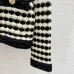 Chanel Women's V   Neck Cardigans  Ribbed Knit with Iconic CC Logo and Button Detail for Luxury Lovers #A56306