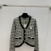 Chanel Women's V   Neck Cardigans  Ribbed Knit with Iconic CC Logo and Button Detail for Luxury Lovers #A56306