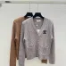 Chanel Women's V-Neck Cardigan with CC Logo Patch and Gold Buttons #A54568