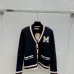 Dark Blue Miu Miu Women's V-Neck Cardigan  Embroidered &quot;M&quot; Logo  Textured Knit Design for Feminine Luxury  #A57759