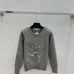 Dior Women's Authentic Luxury Cozy Knit Sweater with Intricate Sparkling Star Sequin Embellishment and Classic Crew Neck Design #A56307