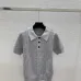 Fendi Women's Luxurious Short Sleeve Knit Polo Top Featuring Iconic FF Monogram Jacquard and Classic Contrast Collar. #A56333