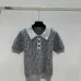 Fendi Women's Luxurious Short Sleeve Knit Polo Top Featuring Iconic FF Monogram Jacquard and Classic Contrast Collar. #A56333