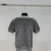 Fendi Women's Luxurious Short Sleeve Knit Polo Top Featuring Iconic FF Monogram Jacquard and Classic Contrast Collar. #A56333